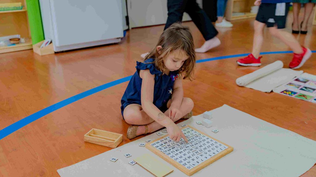 Montessori Children Play  in the Classroom